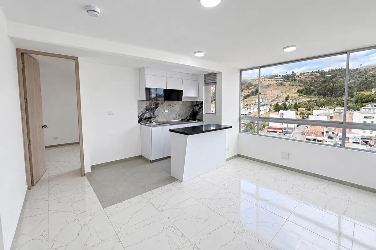 Sala-comedor del apartamento de tres habitaciones en Tunja